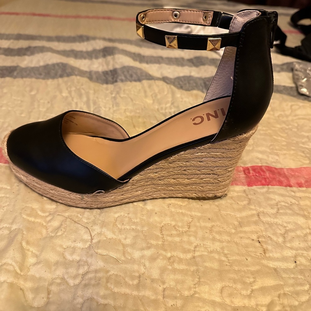 Black leather wedges, so comfortable. Never been worn. No box.